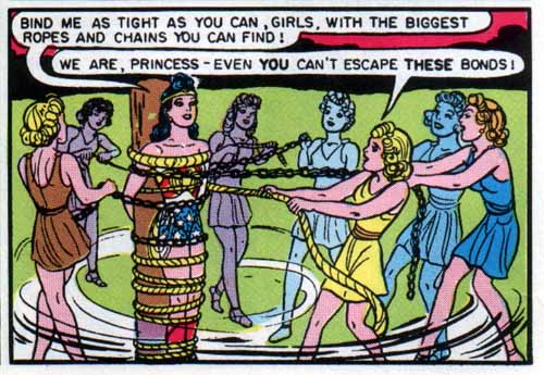 Wonder Woman gets tied up by a bunch of her Amazon sisters