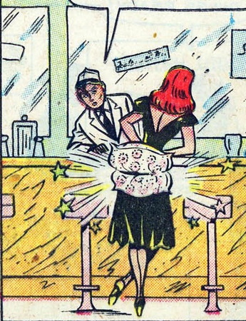 patsy walker with pillow under her bottom