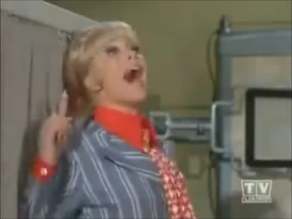 barbara eden about to get whacked with a clipboard