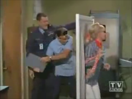 barbara eden about to get whacked with a clipboard