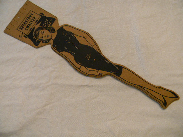 fly swatter shaped like secretary